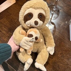 Adorable Tan and White Stuffed Sloth Toy